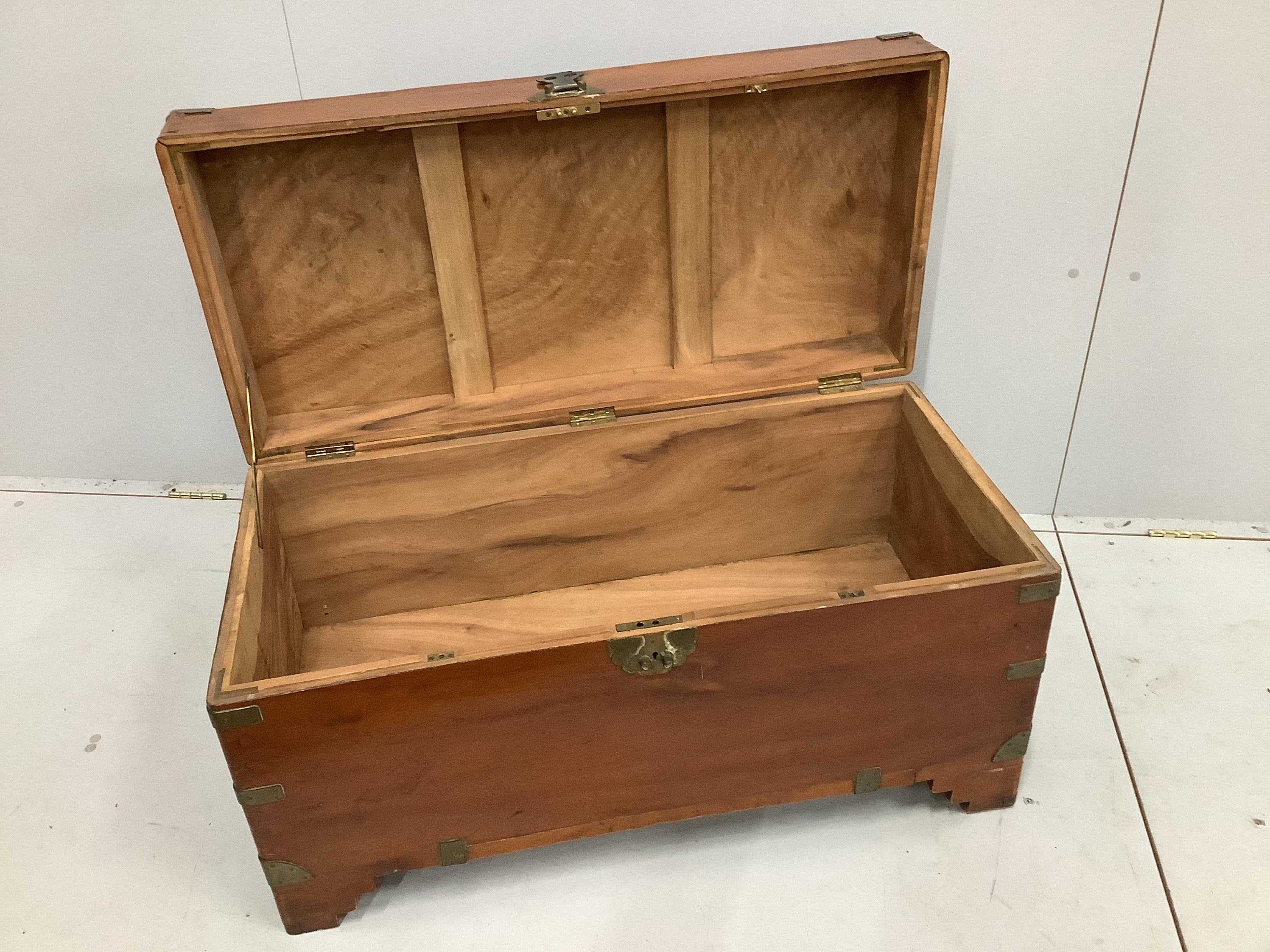 A Chinese brass mounted camphorwood trunk, width 93cm, depth 45cm, height 50cm